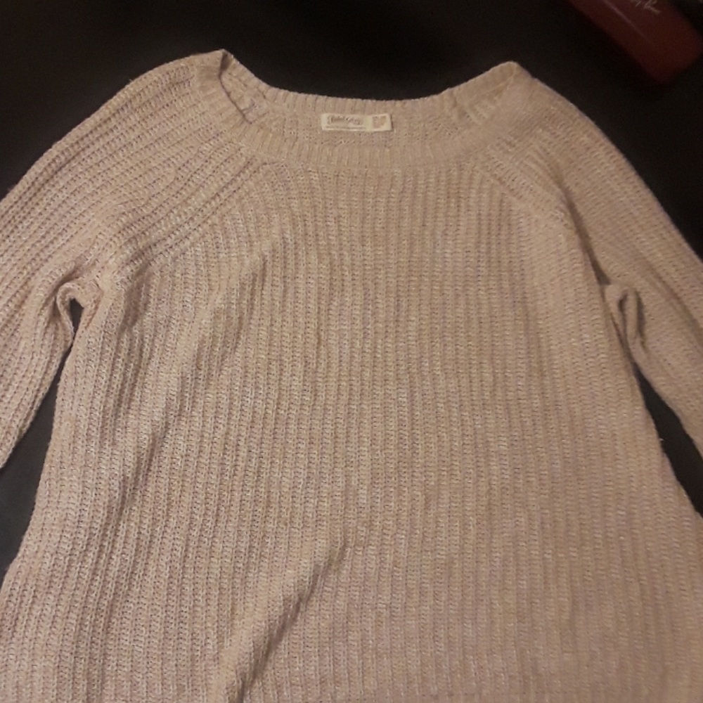 A knitted sand color sweater
